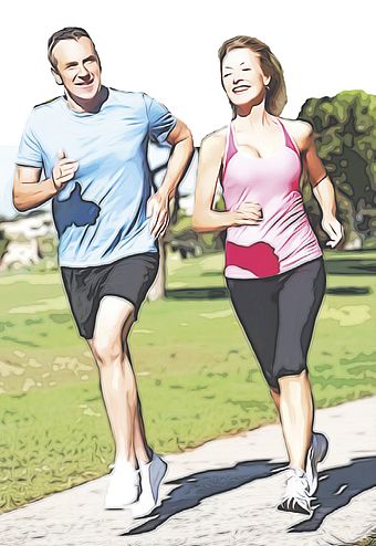 Ein Mann und eine Frau in Sportkleidung joggen im Freien. 